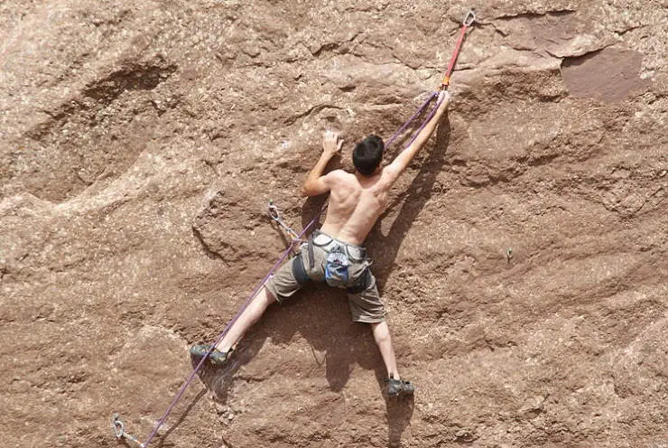 What Is A Redpoint In Climbing - Clipping Quickdraws
